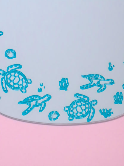 Turtle Mirror in a Turquoise Colour.