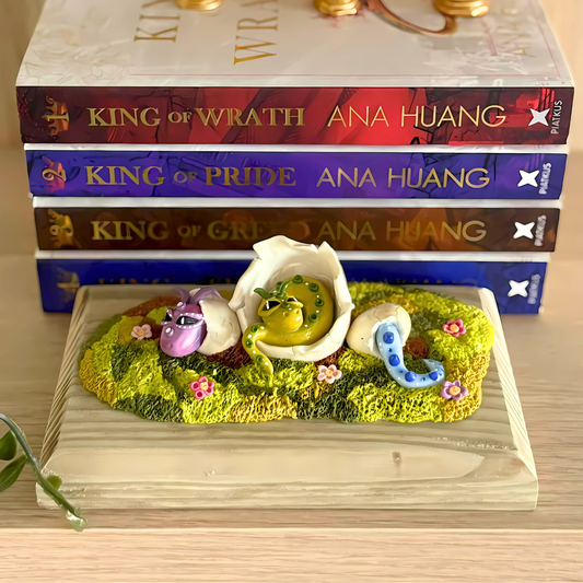 Whimsical Baby Dragons Figure Hatching Out Their Eggs.